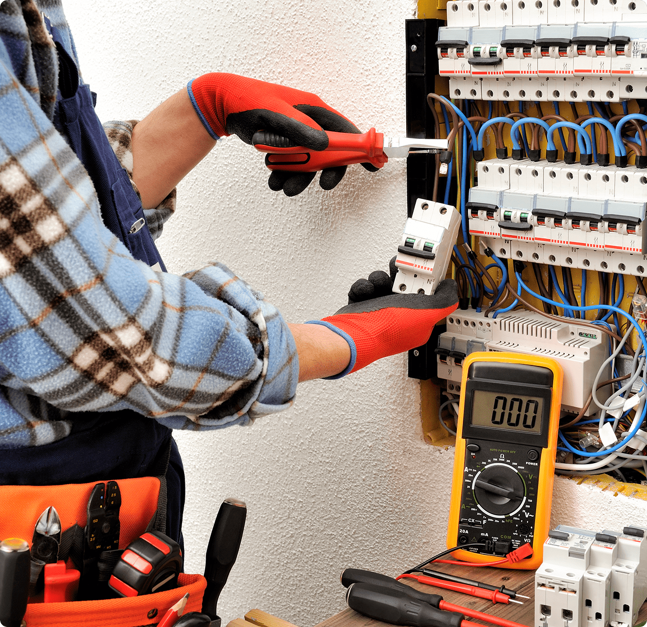 Technician repairing electrical circuit board